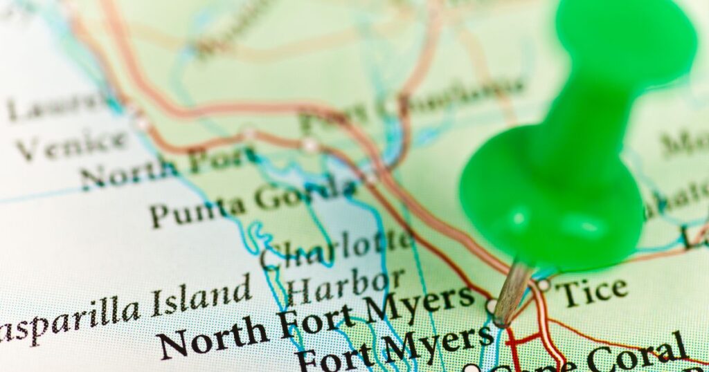 A map of Fort Myers, FL and surrounding areas with a green push pin stuck in the center of Fort Myers